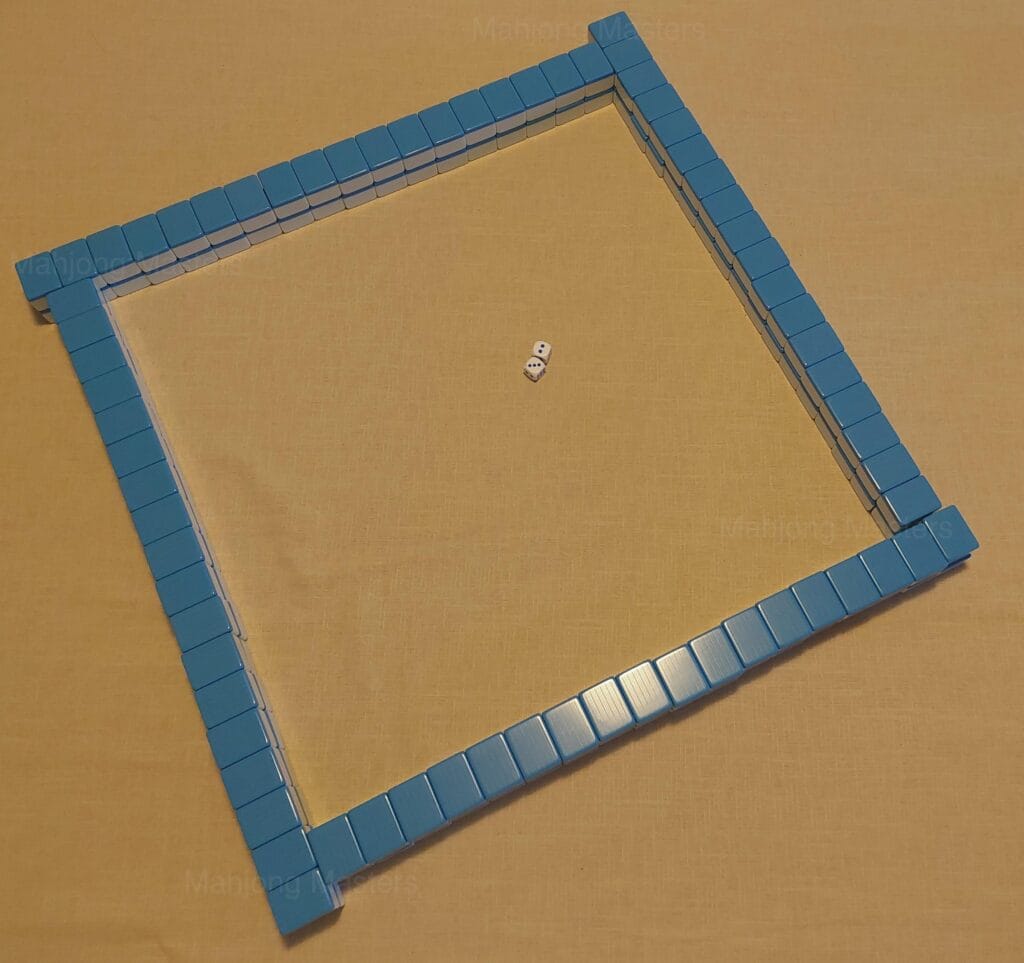 Completed mahjong wall built and ready at the start of a game